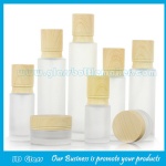 New Item Frost Cylinder Glass Lotion Bottles & Glass Cosmetic Jars With Wood Caps For Skincare